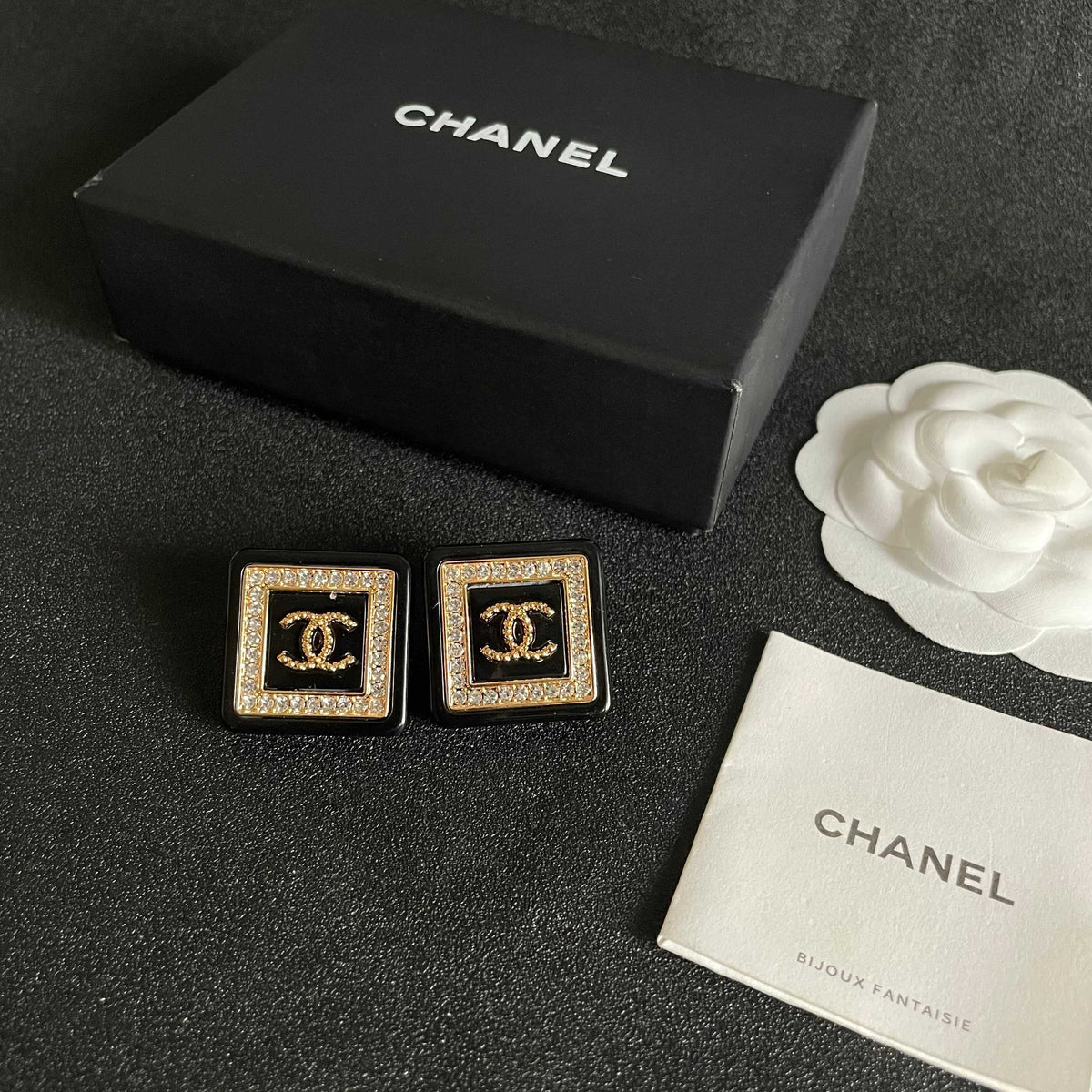 Double-C Emblem Stud Earrings in Polished Metal-Tone – Design 304 close-up detail