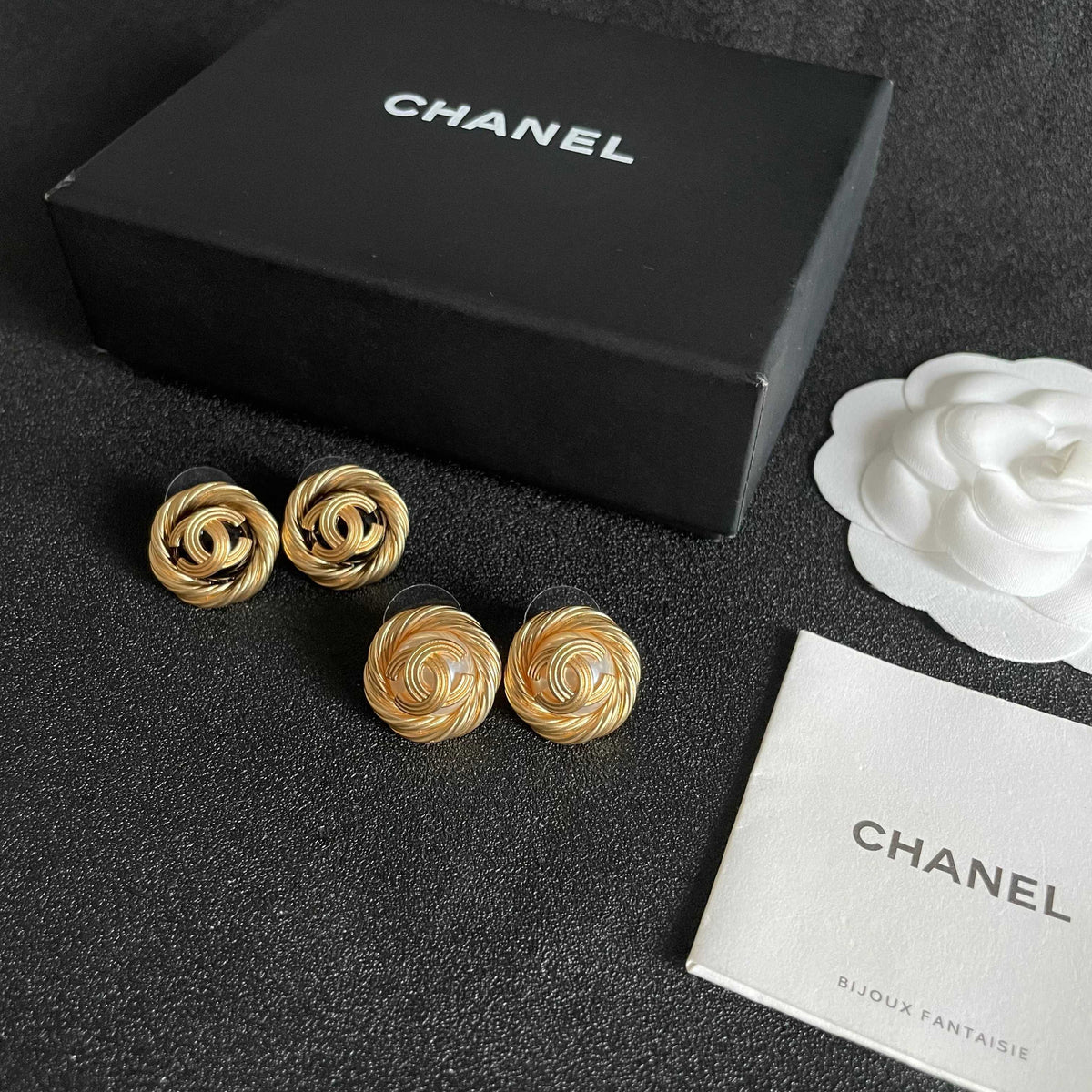 Double-C Emblem Stud Earrings in Polished Metal-Tone – Design 302 close-up detail