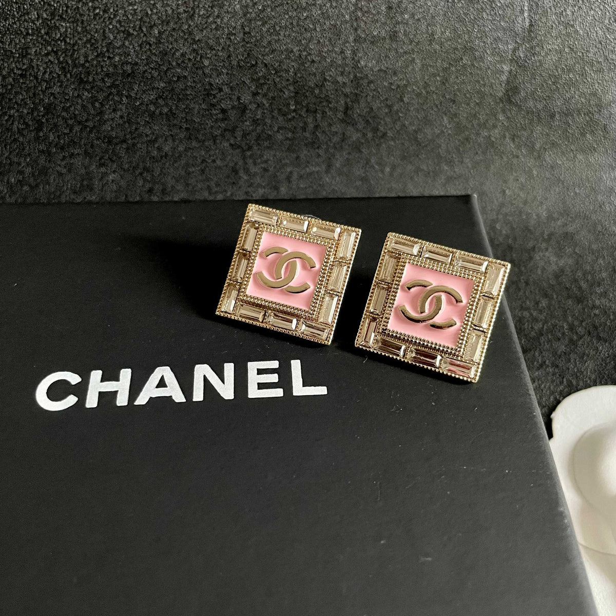 Double-C Emblem Stud Earrings in Polished Metal-Tone – Design 401 detail view