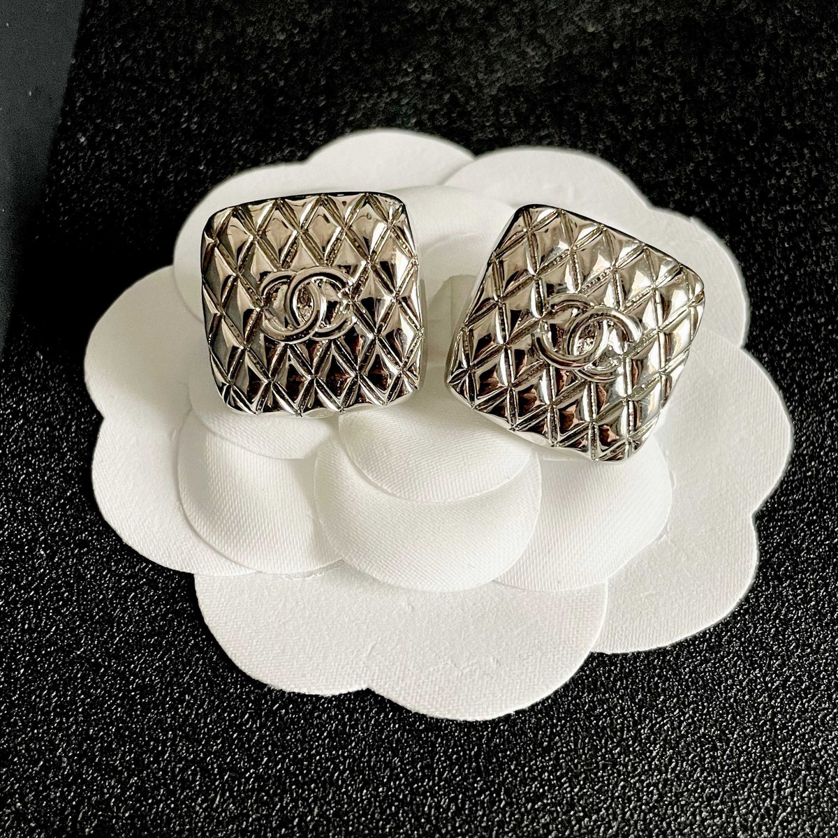 Double-C Emblem Stud Earrings in Polished Metal-Tone – Design 077 front product view