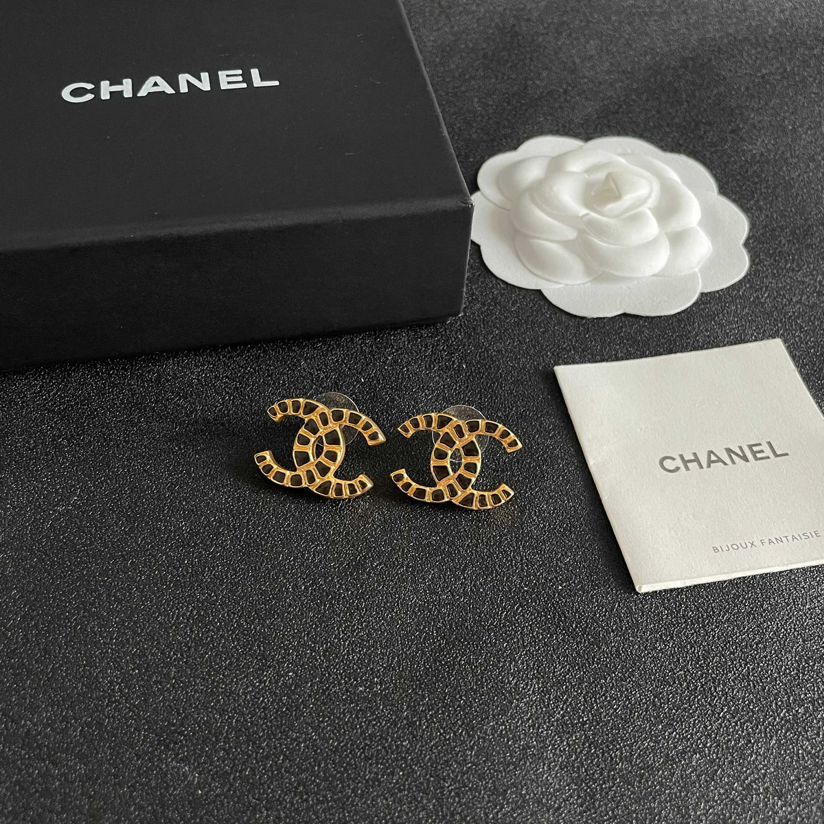 Double-C Emblem Stud Earrings in Polished Metal-Tone – Design 424 styled product view