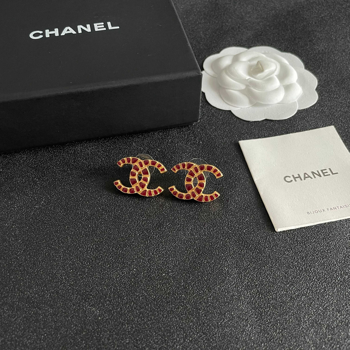 Double-C Emblem Stud Earrings in Polished Metal-Tone – Design 423 styled product view