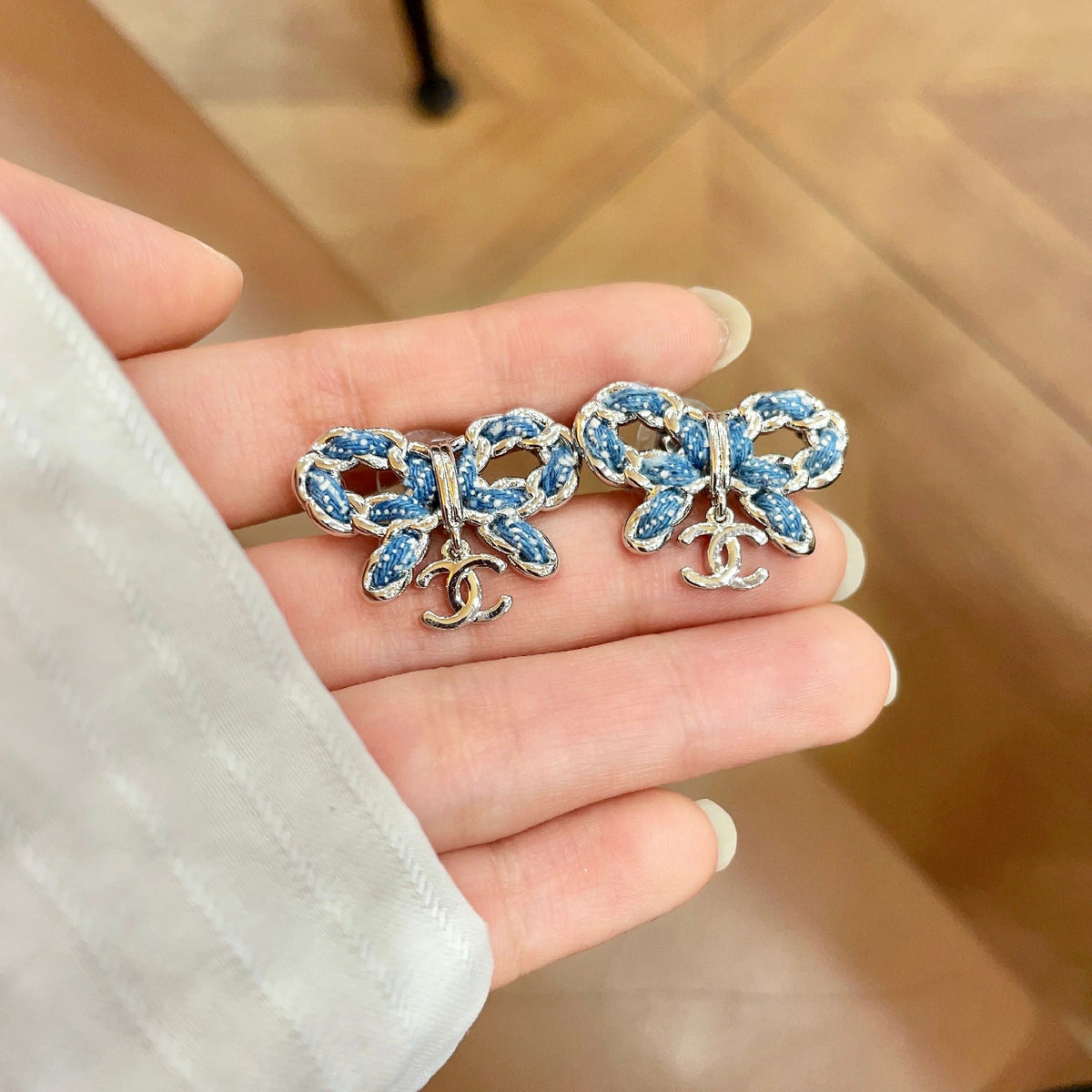 Signature Emblem Stud Earrings in Polished Metal-Tone – Design 120 side detail