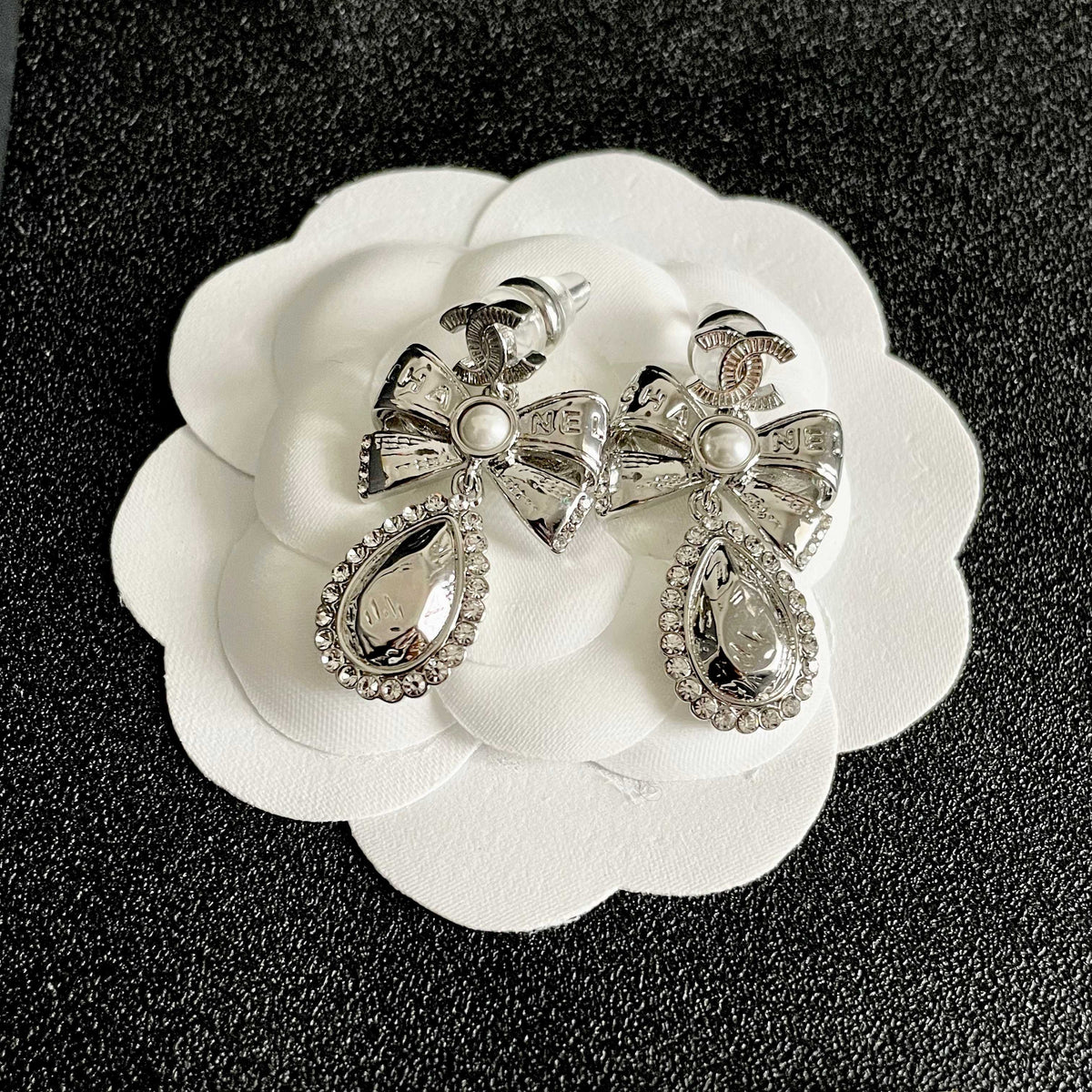 Signature Emblem Stud Earrings in Polished Metal-Tone – Design 118 front product view