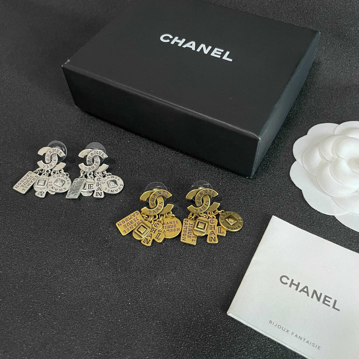 Double-C Emblem Stud Earrings in Polished Metal-Tone – Design 450 close-up detail