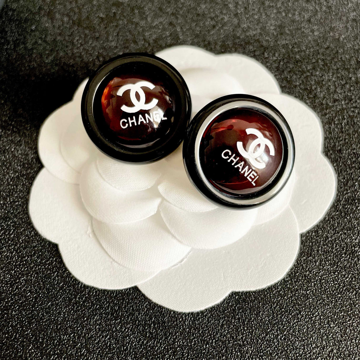 Double-C Emblem Stud Earrings in Polished Metal-Tone – Design 447 front product view