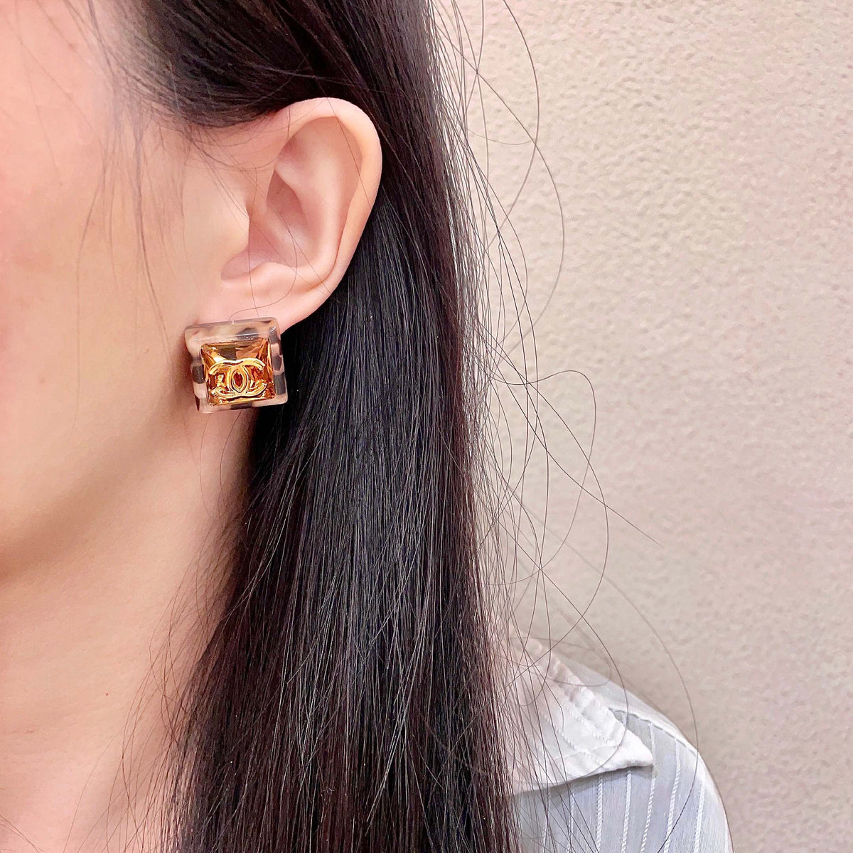 Double-C Emblem Stud Earrings in Polished Metal-Tone – Design 446 detail view
