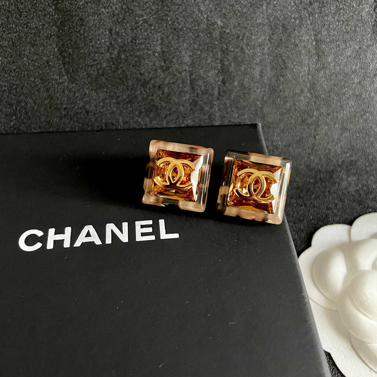 Double-C Emblem Stud Earrings in Polished Metal-Tone – Design 446 detail view