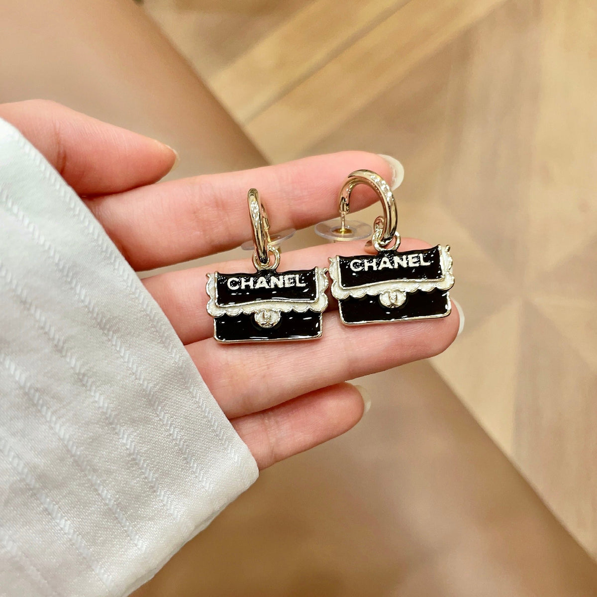Double-C Emblem Stud Earrings in Polished Metal-Tone – Design 444 side detail