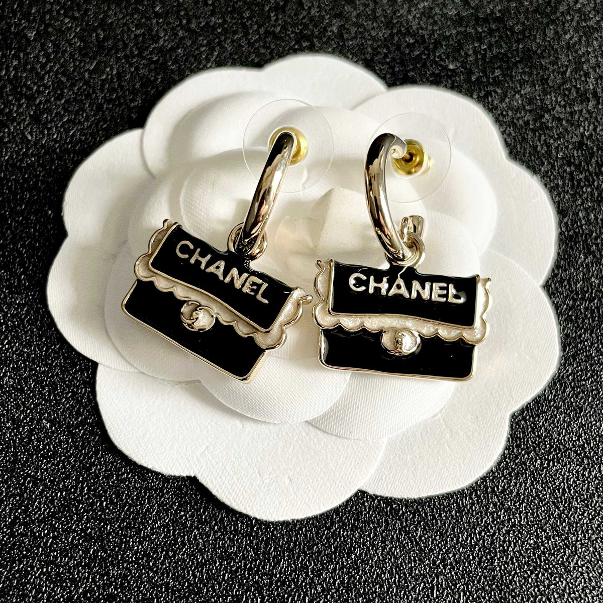 Double-C Emblem Stud Earrings in Polished Metal-Tone – Design 444 front product view