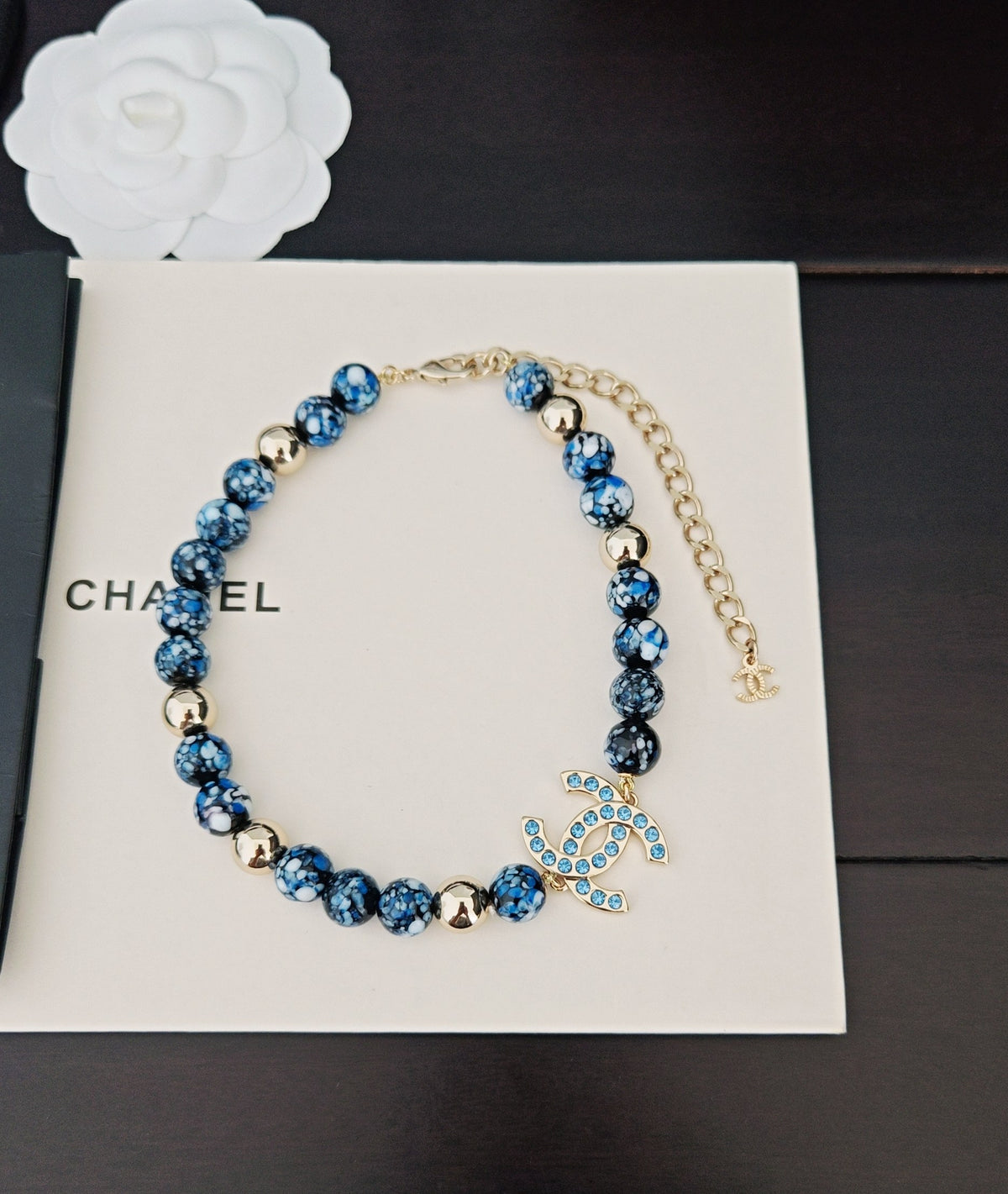Signature Emblem Pendant Necklace in Gold-Tone – Blue Detail front product view