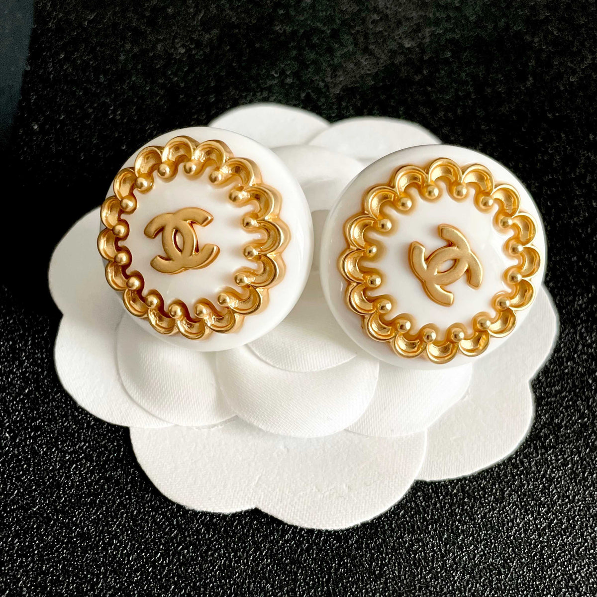 Double-C Emblem Stud Earrings in Polished Metal-Tone – Design 411 front product view