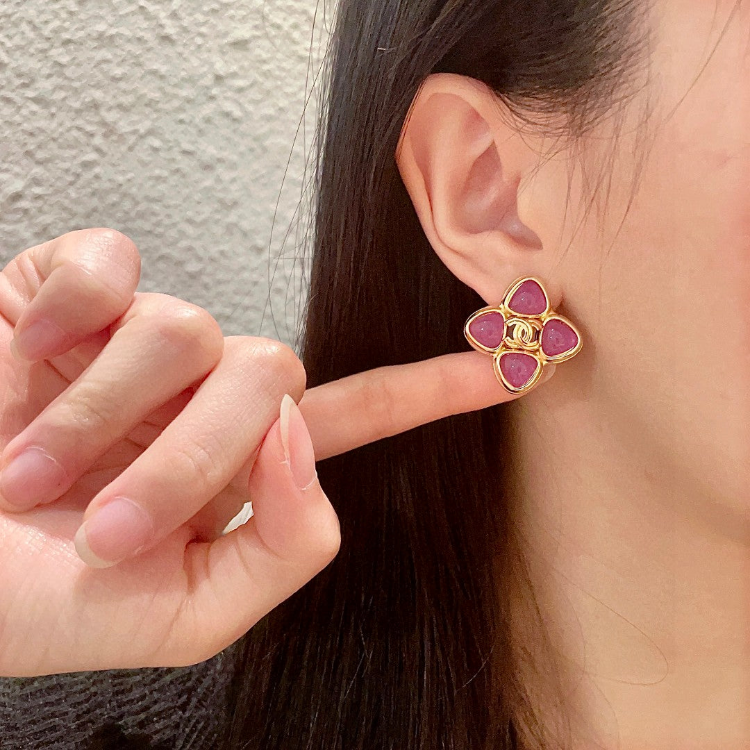 Double-C Emblem Stud Earrings in Polished Metal-Tone – Design 474 front product view