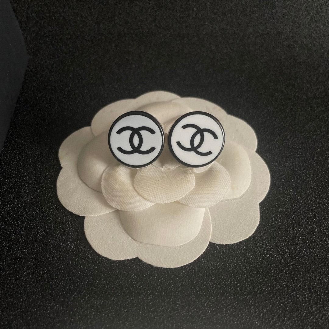 Double-C Emblem Stud Earrings in Polished Metal-Tone – Design 470 front product view