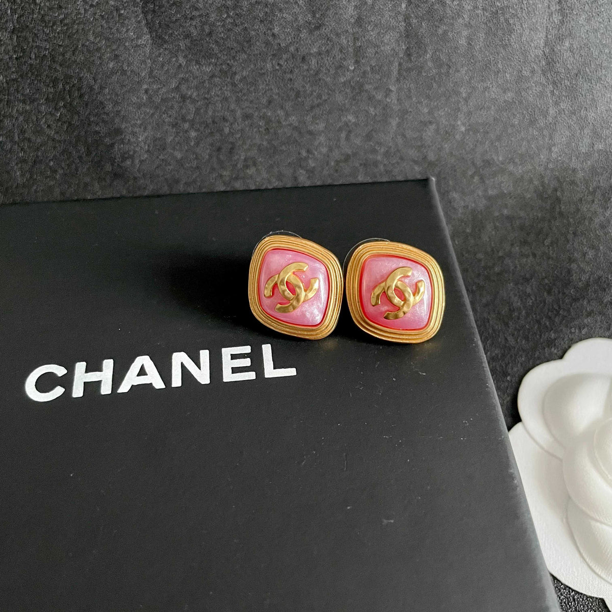 Double-C Emblem Stud Earrings in Polished Metal-Tone – Design 430 detail view