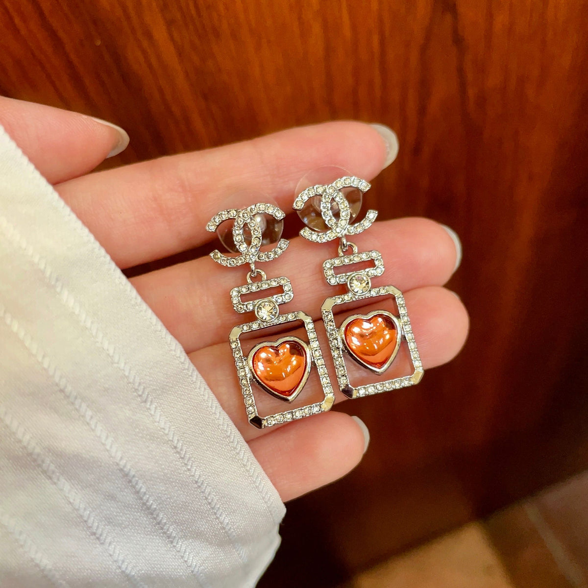 Double-C Emblem Statement Earrings in Polished Metal-Tone – Heart Detail – Design 008 side detail