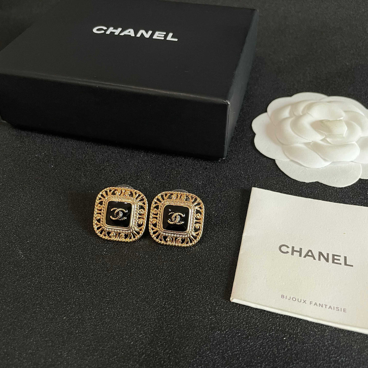 Double-C Emblem Stud Earrings in Polished Metal-Tone – Design 140 close-up detail
