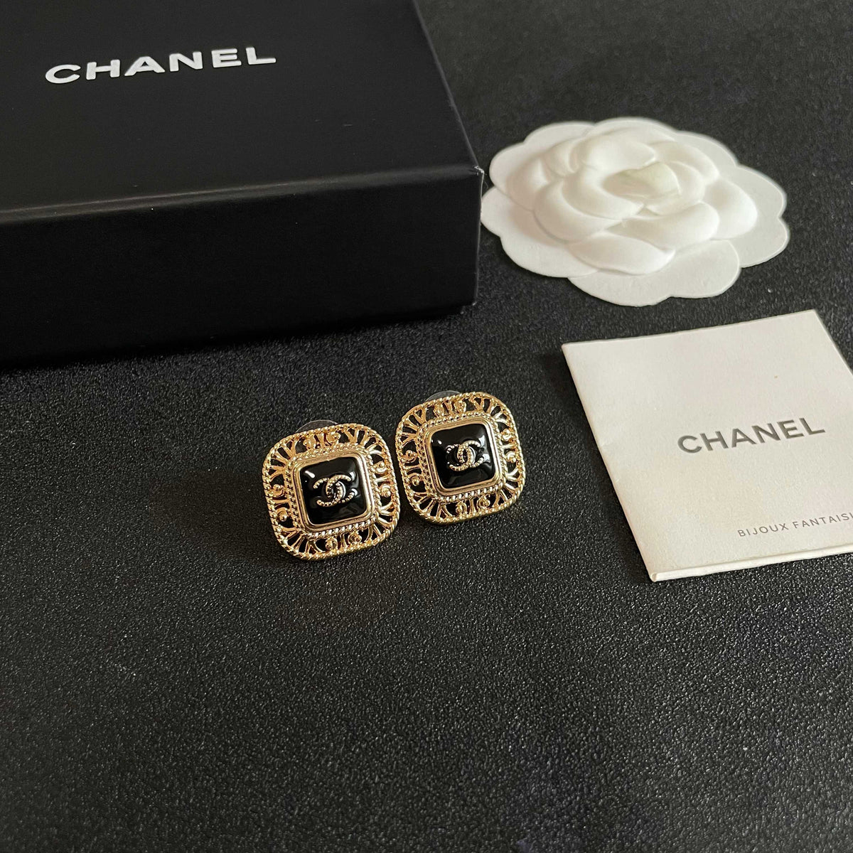 Double-C Emblem Stud Earrings in Polished Metal-Tone – Design 140 styled product view