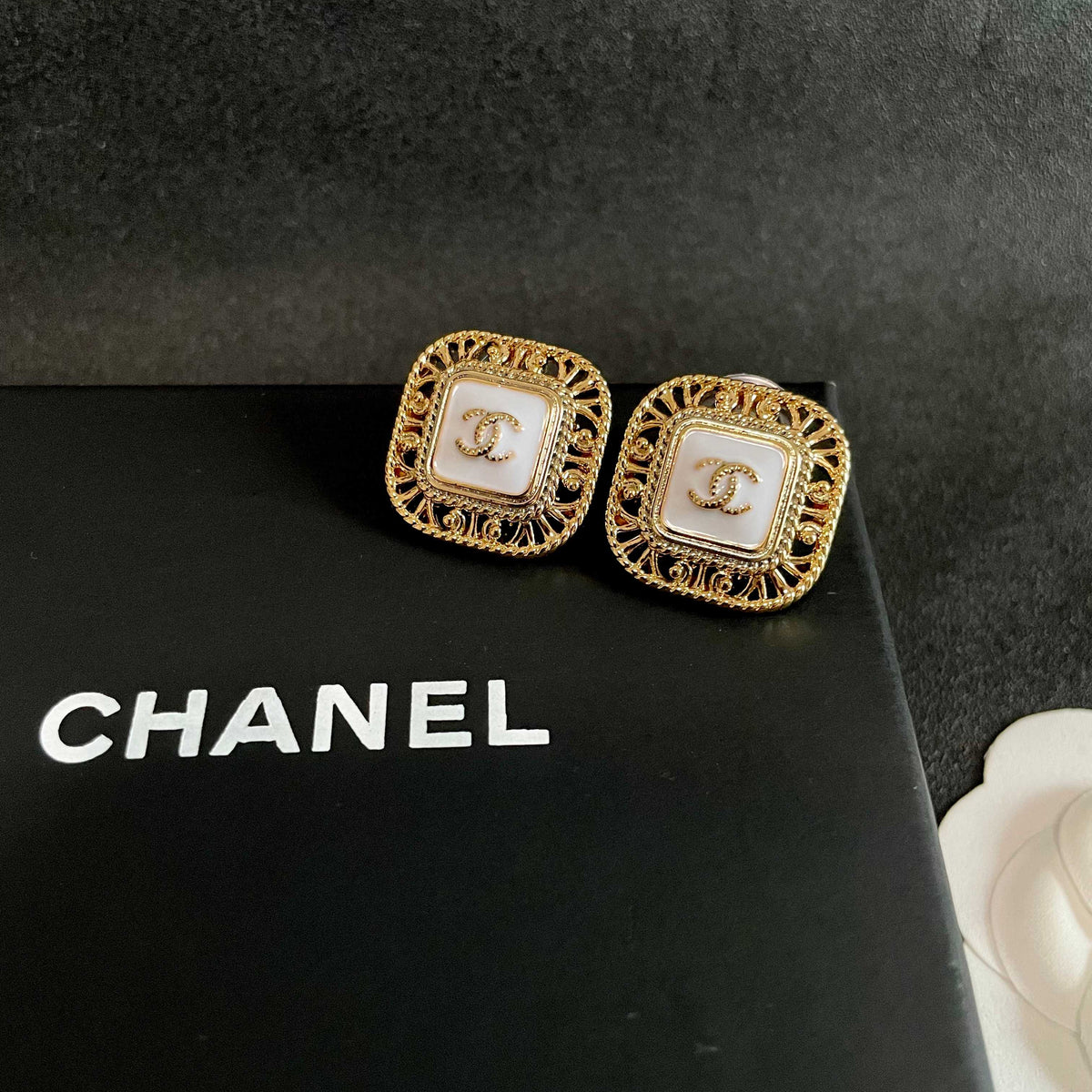 Double-C Emblem Stud Earrings in Polished Metal-Tone – Design 139 detail view