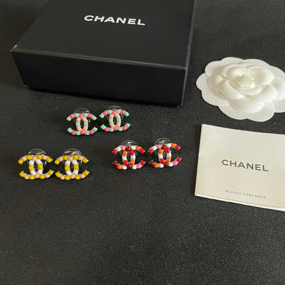 Double-C Emblem Stud Earrings in Polished Metal-Tone – Design 137 close-up detail