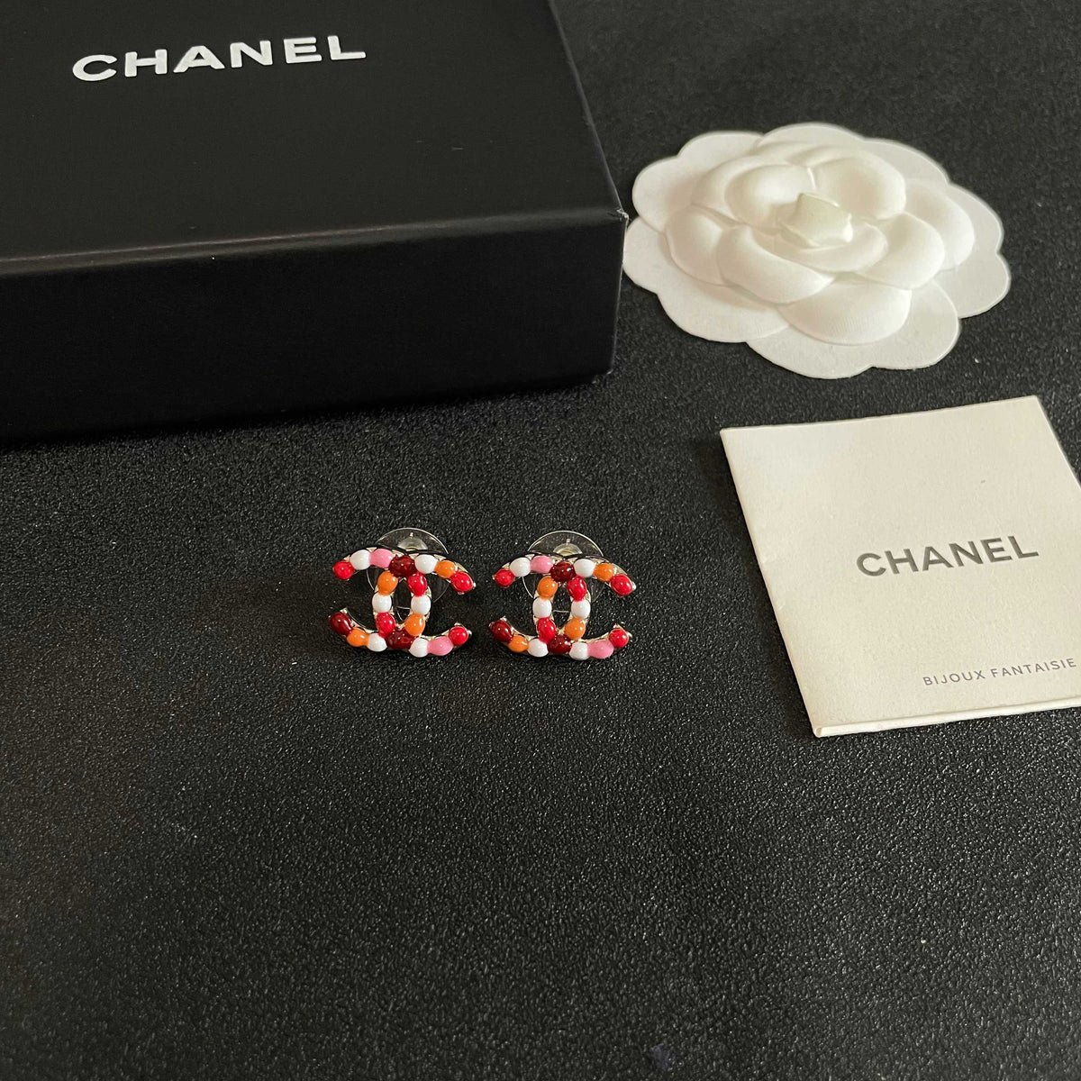 Double-C Emblem Stud Earrings in Polished Metal-Tone – Design 137 styled product view