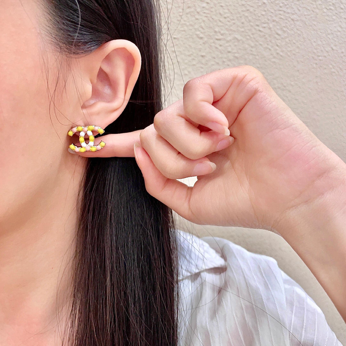 Double-C Emblem Stud Earrings in Polished Metal-Tone – Design 135 front product view