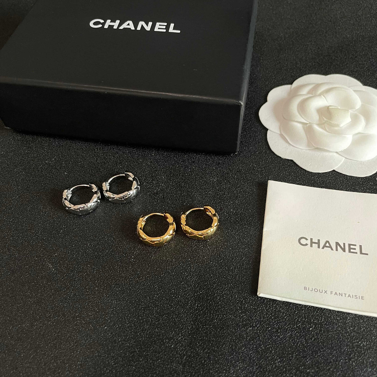 Double-C Emblem Stud Earrings in Polished Metal-Tone – Design 130 side detail