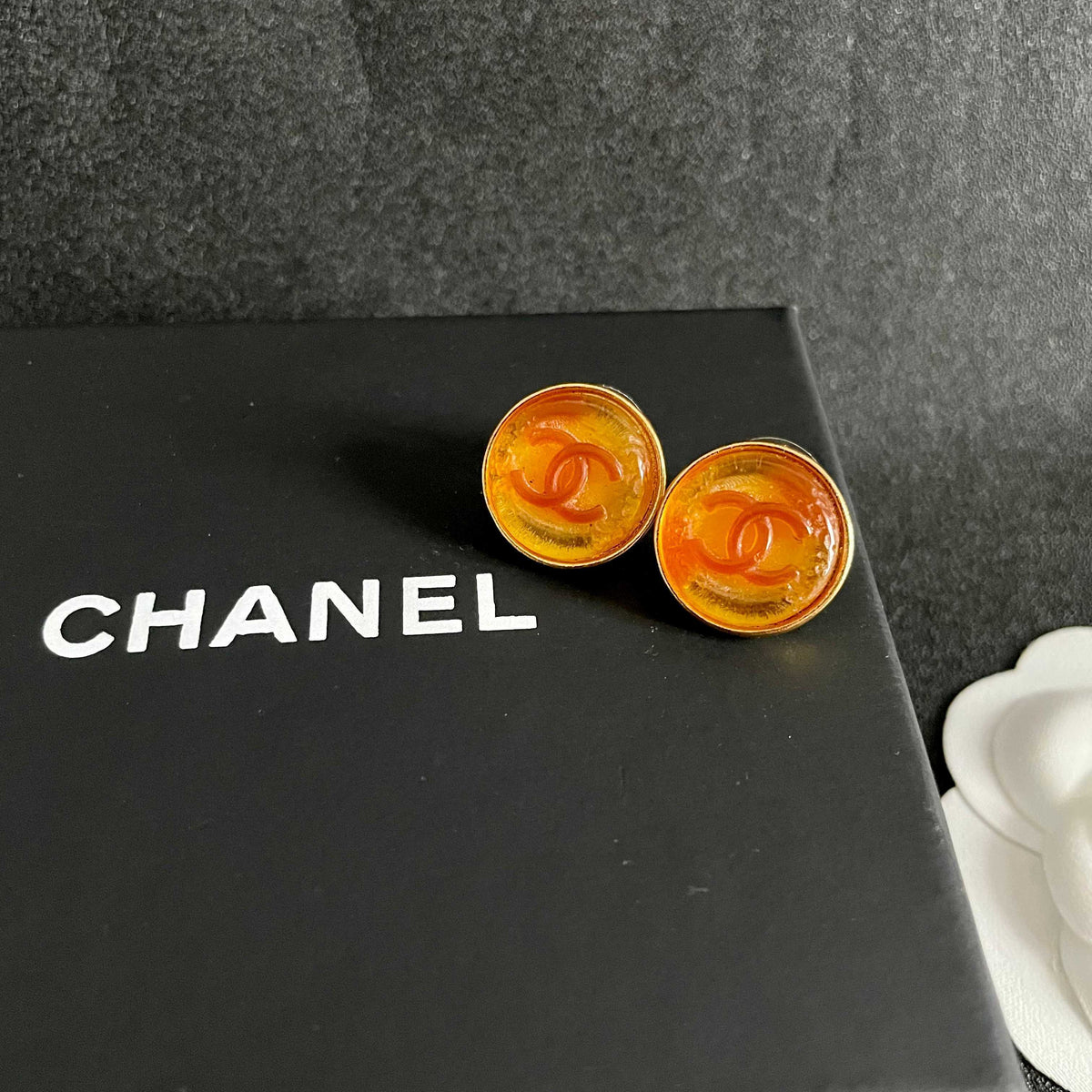 Double-C Emblem Stud Earrings in Polished Metal-Tone – Design 033 detail view