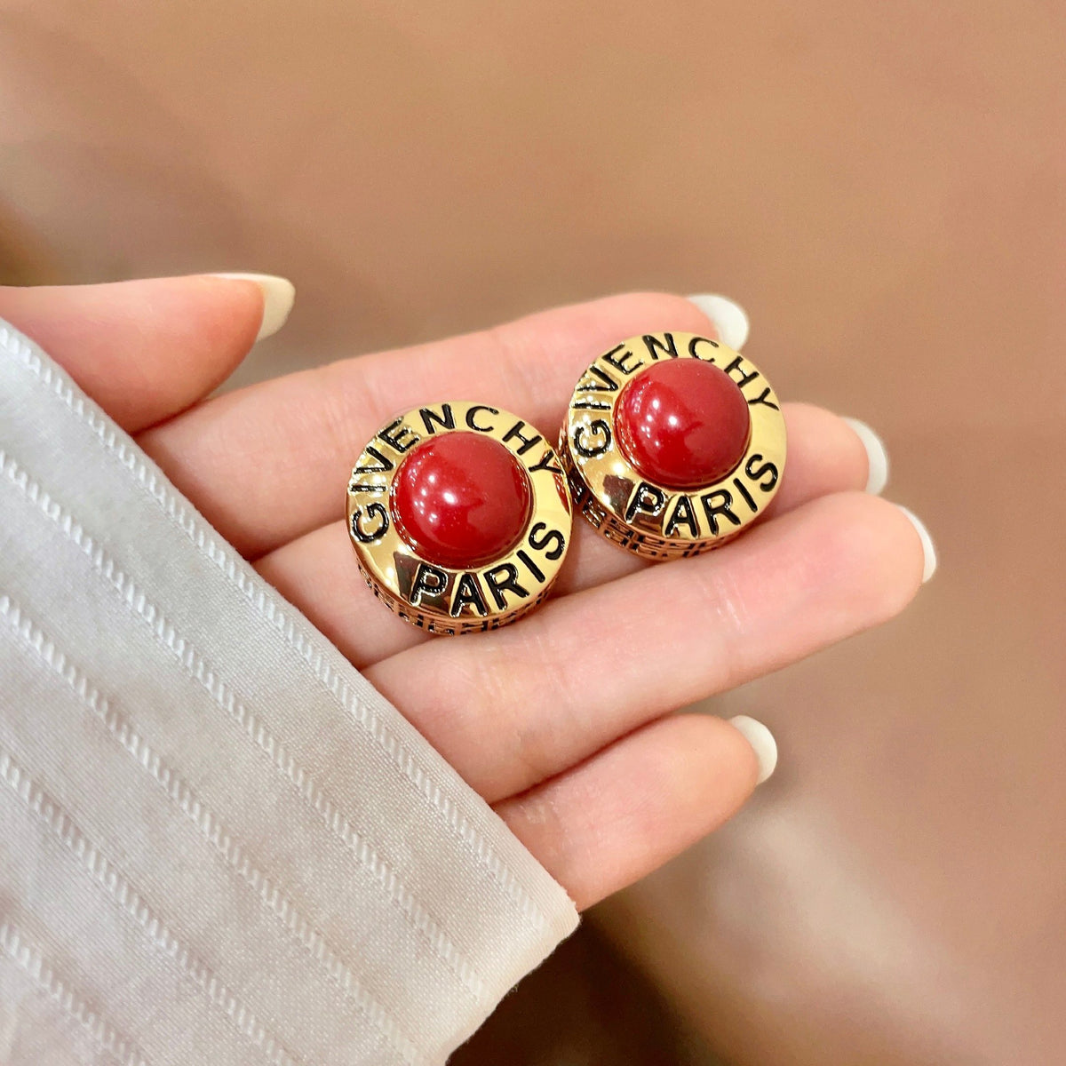 Round Emblem Stud Earrings side detail