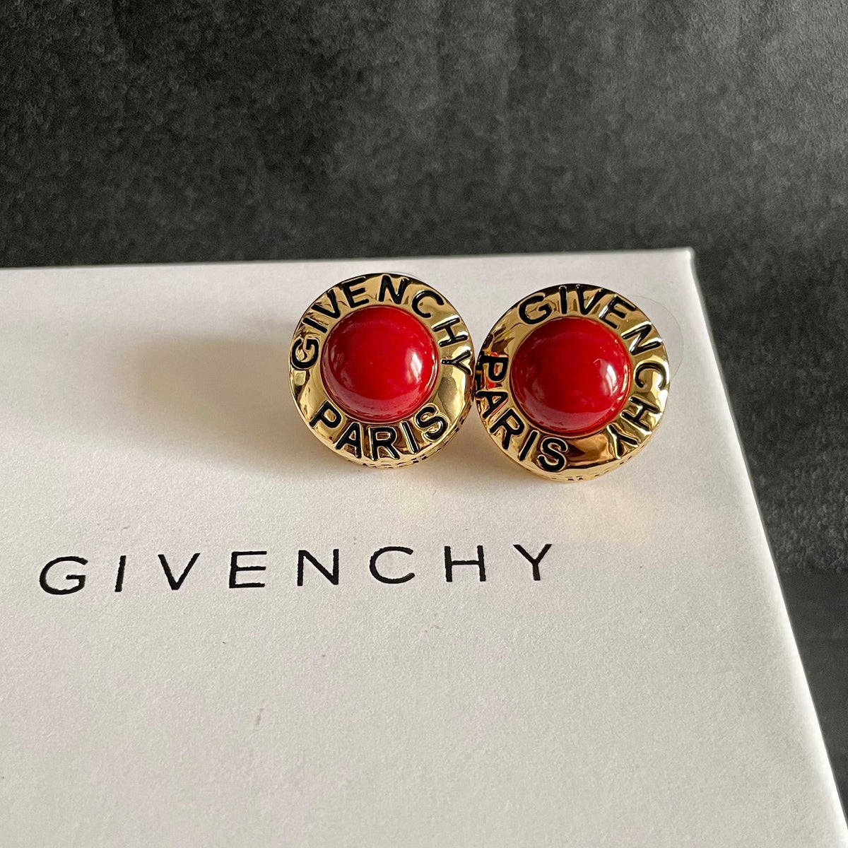 Round Emblem Stud Earrings detail view