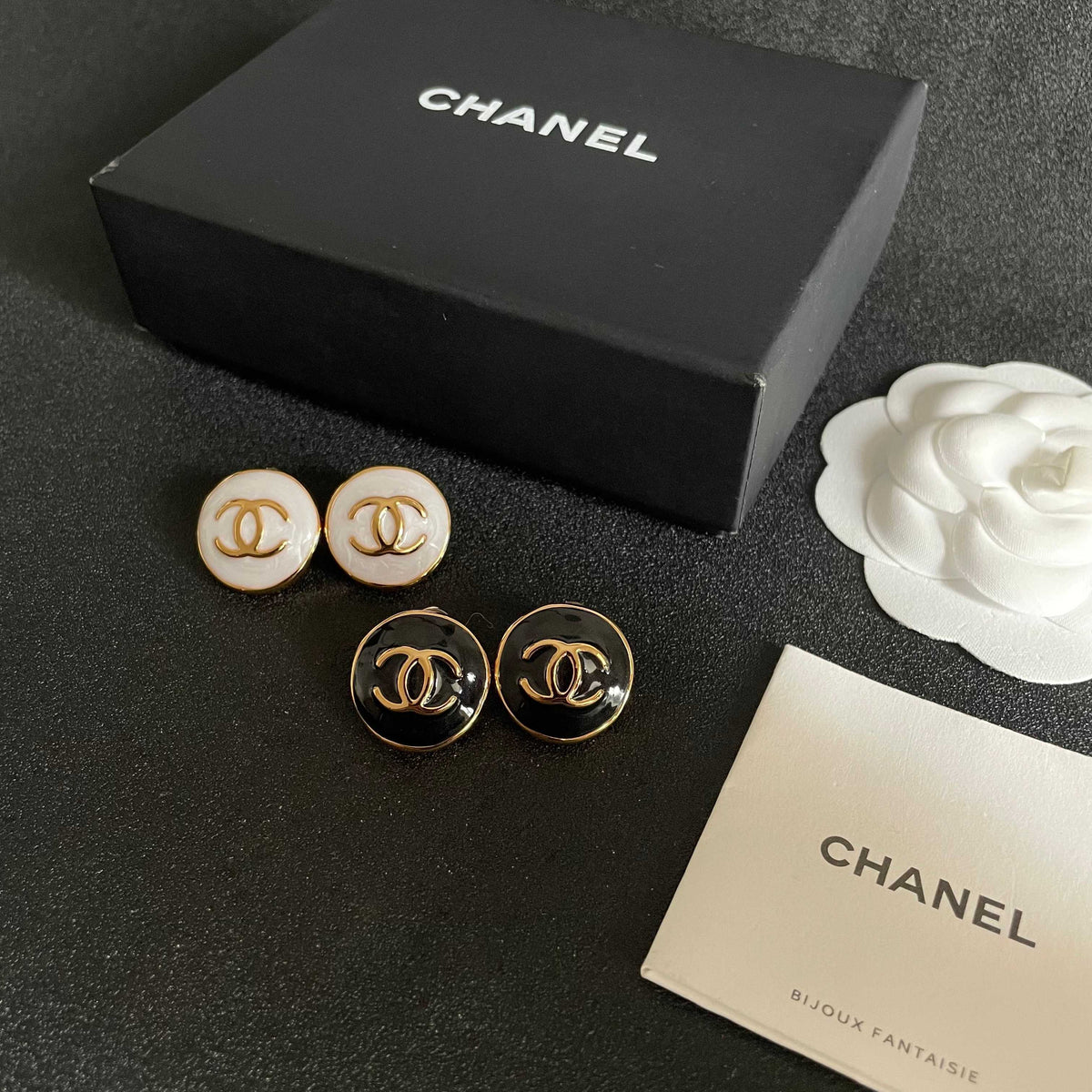 Double-C Emblem Stud Earrings in Polished Metal-Tone – Design 088 close-up detail