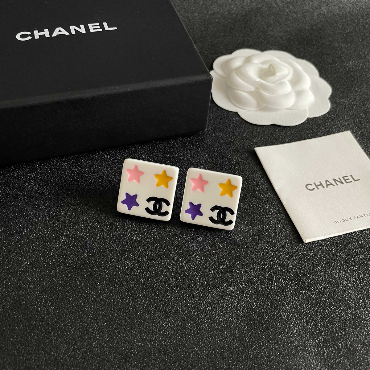 Double-C Emblem Stud Earrings in Polished Metal-Tone – Star Detail styled product view