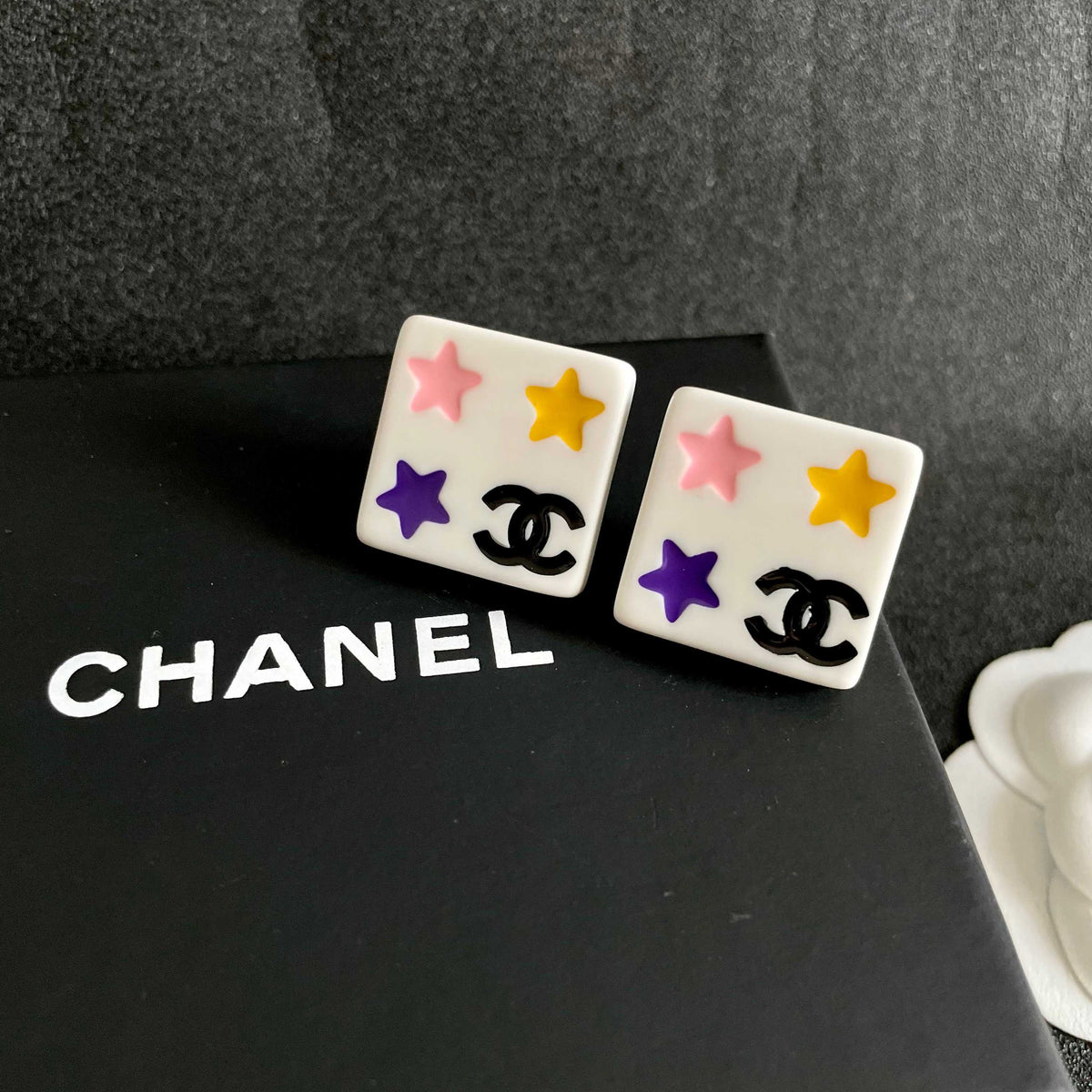 Double-C Emblem Stud Earrings in Polished Metal-Tone – Star Detail – Design 003 detail view