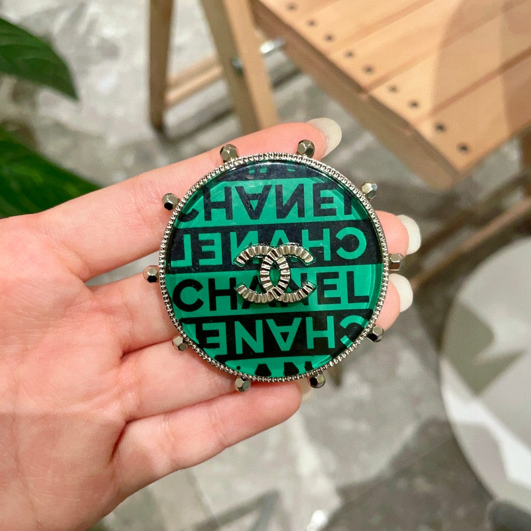 Double-C Emblem Brooch in Polished Metal-Tone – Design 001 detail view