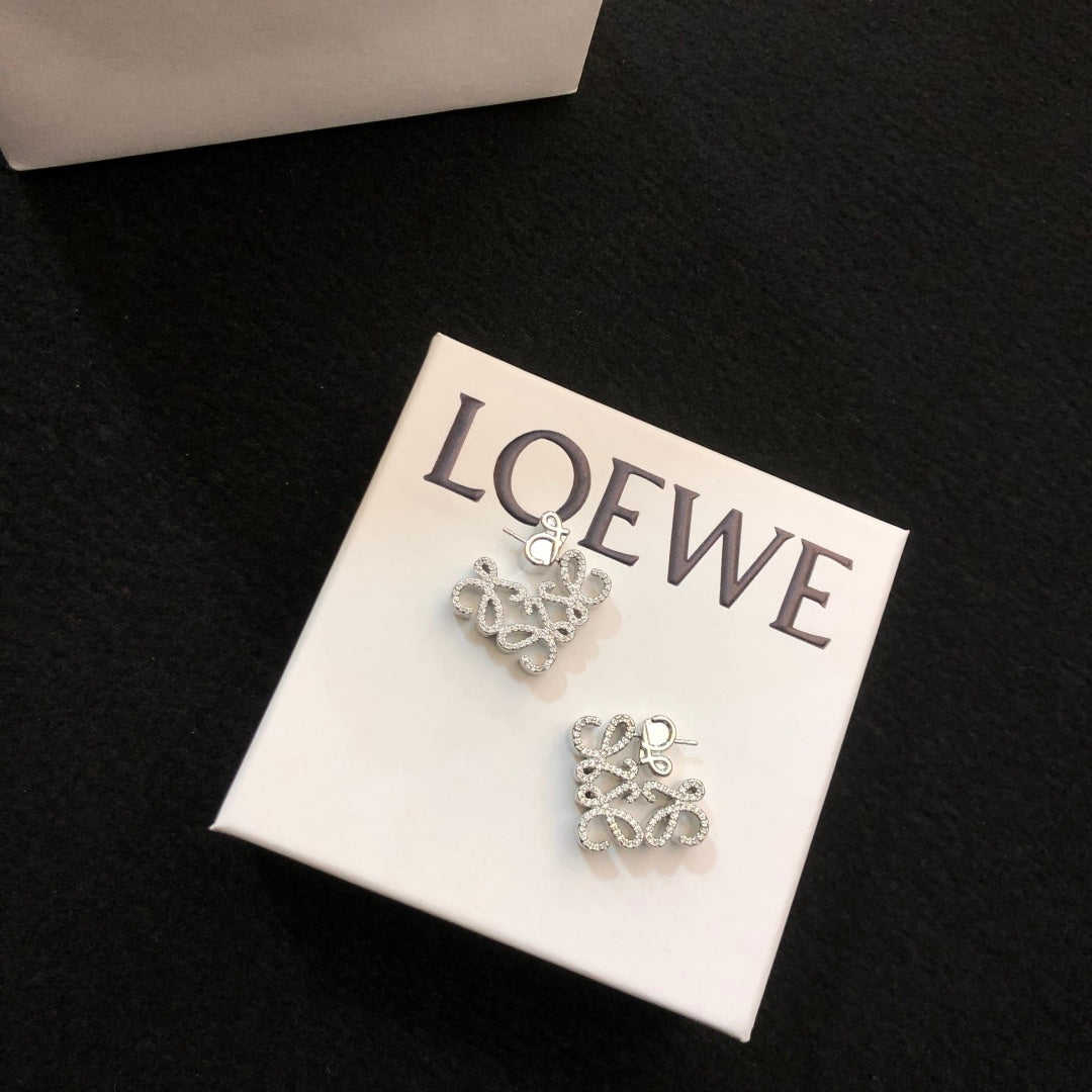 Floral Motif Stud Earrings in Polished Metal-Tone with Crystal-Style Accents detail view
