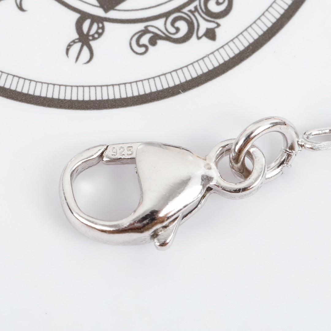 Geometric Emblem Pendant Necklace in Silver-Tone – Gold Detail front product view
