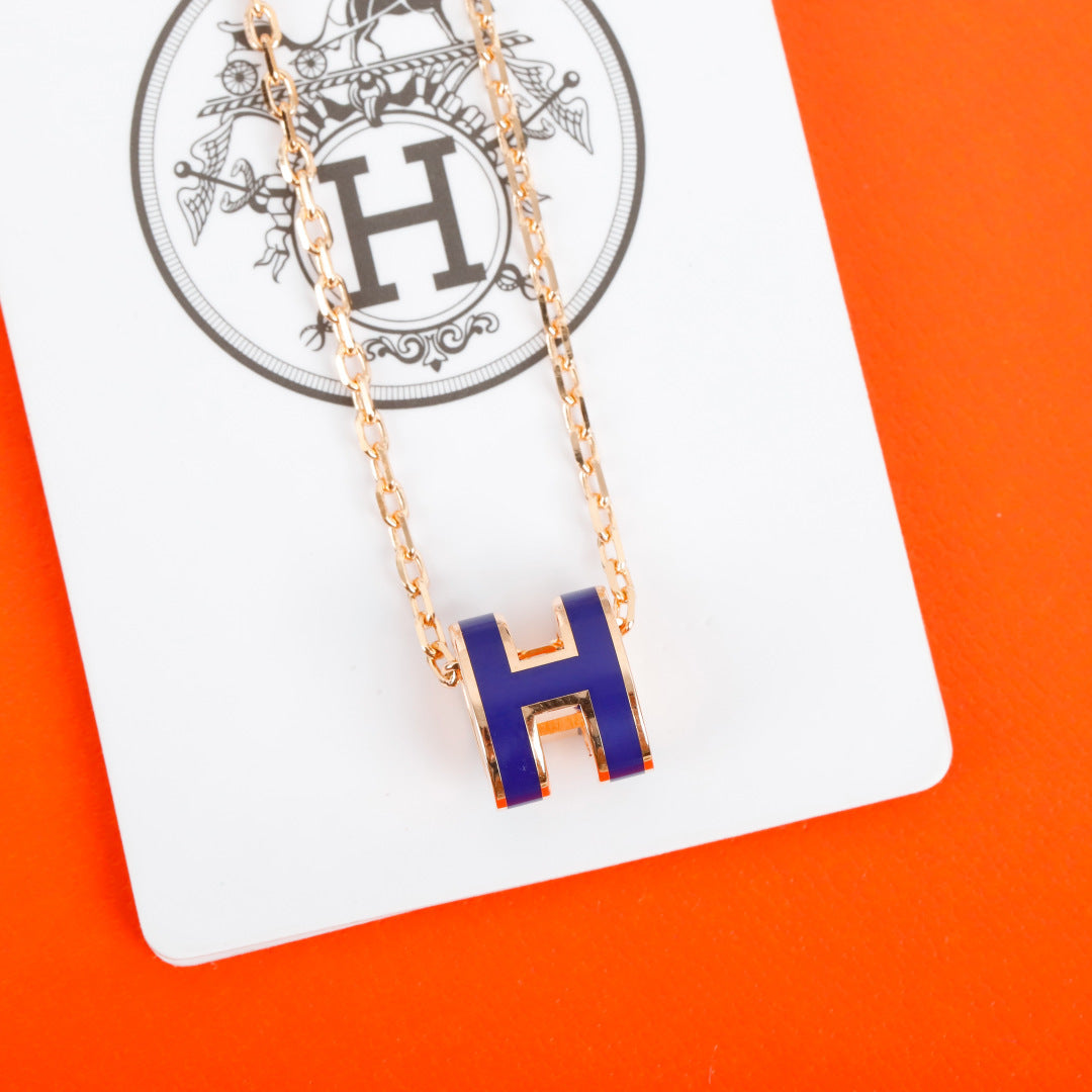 Geometric Emblem Pendant Necklace in Silver-Tone – Gold Detail detail view
