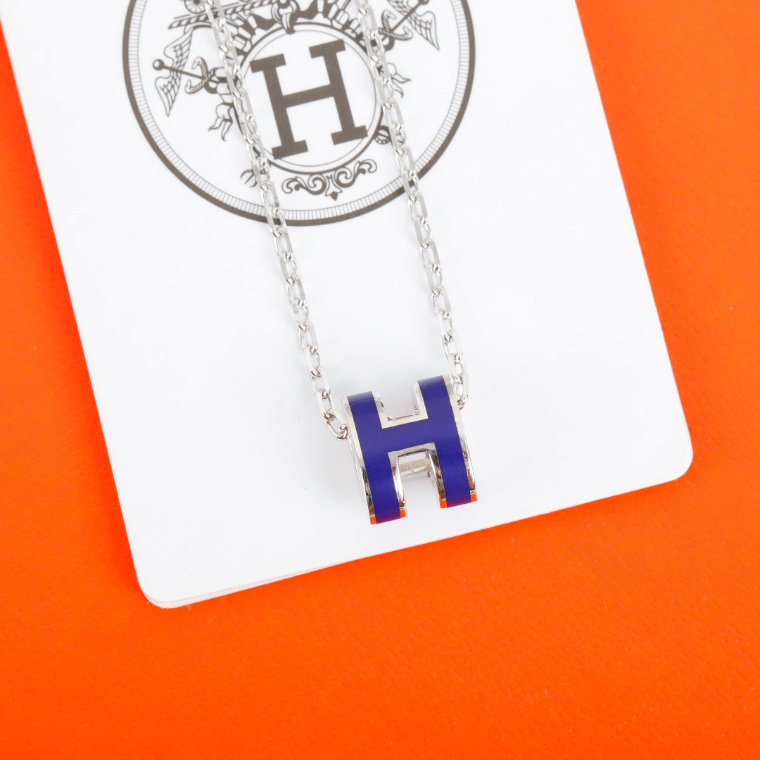 Geometric Emblem Pendant Necklace in Silver-Tone – Gold Detail side detail