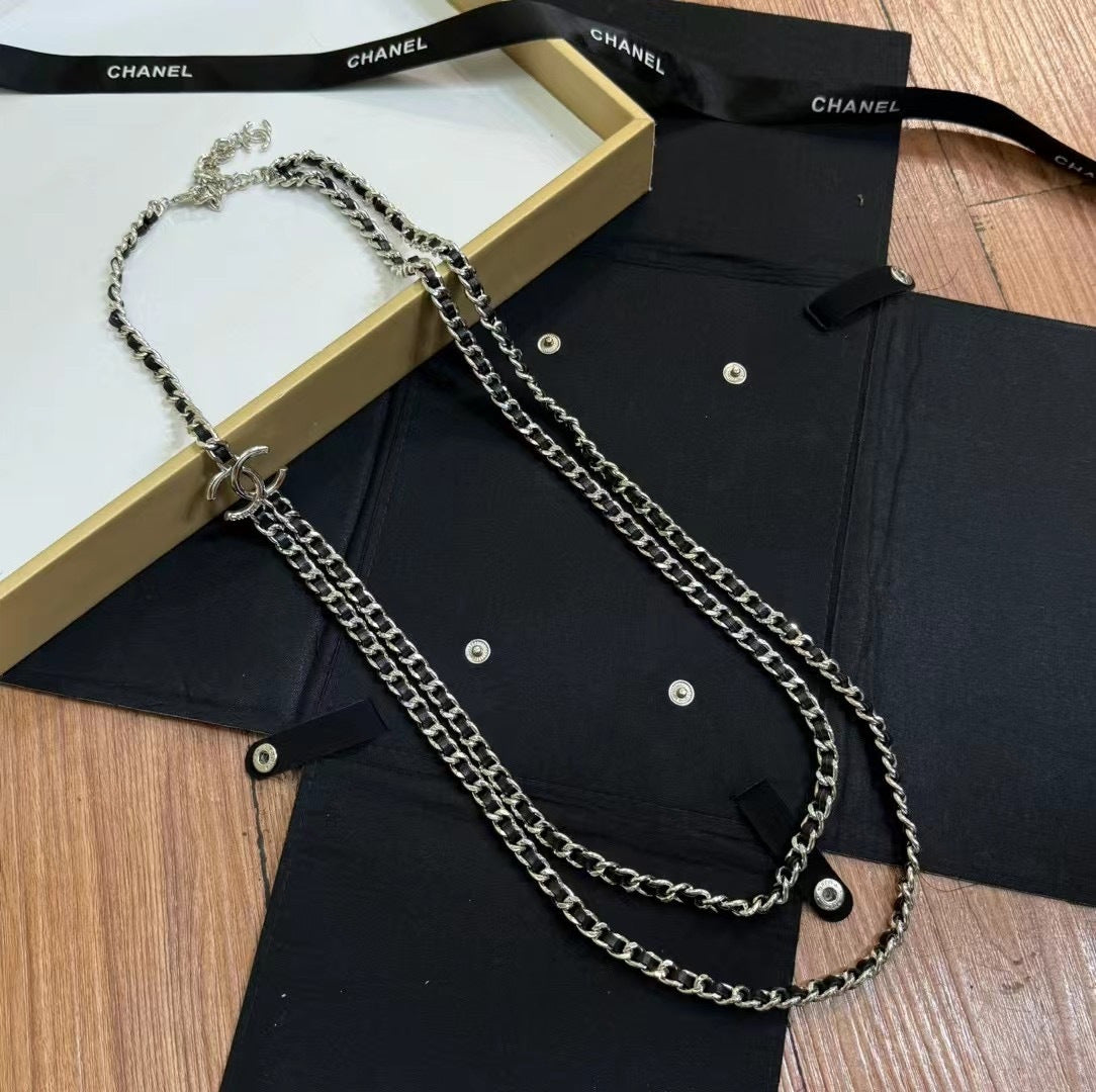 Double-C Emblem Pendant Necklace in Polished Metal-Tone – Black Detail – Design 003 close-up detail