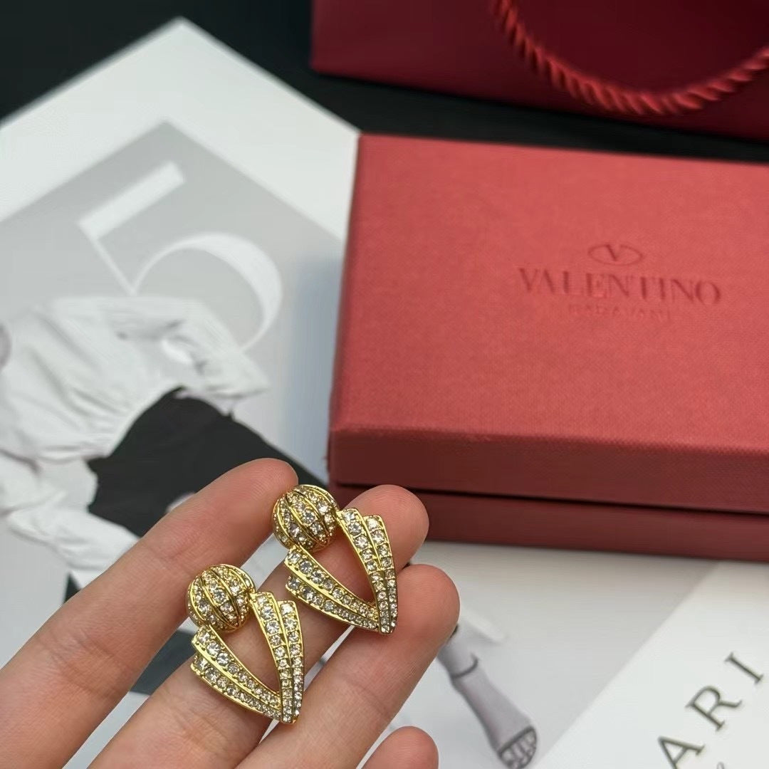 Signature Emblem Crystal-Accent Stud Earrings – Design 09 close-up view