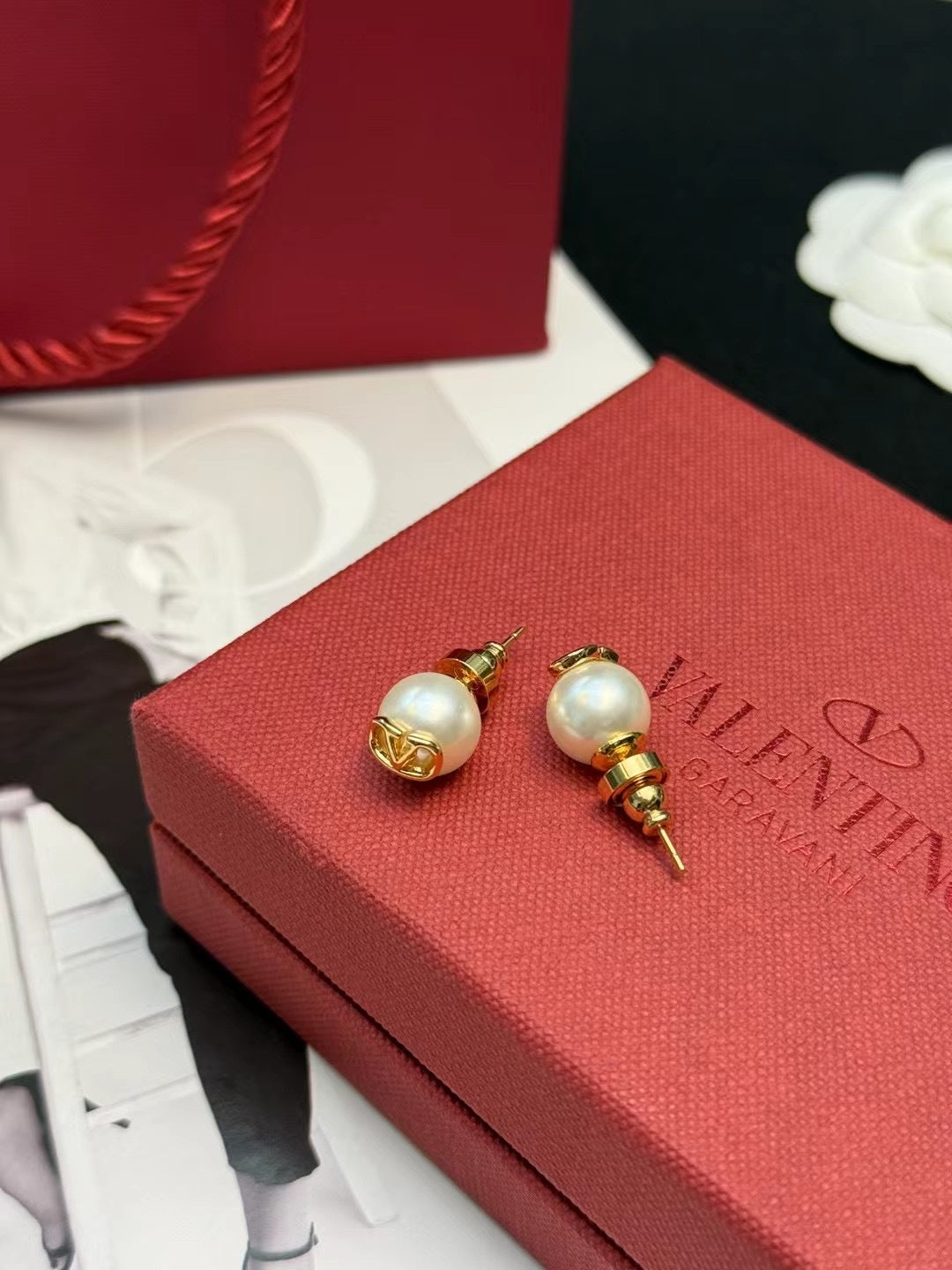 Signature Emblem Pearl-Detail Stud Earrings – Design 03 close-up view