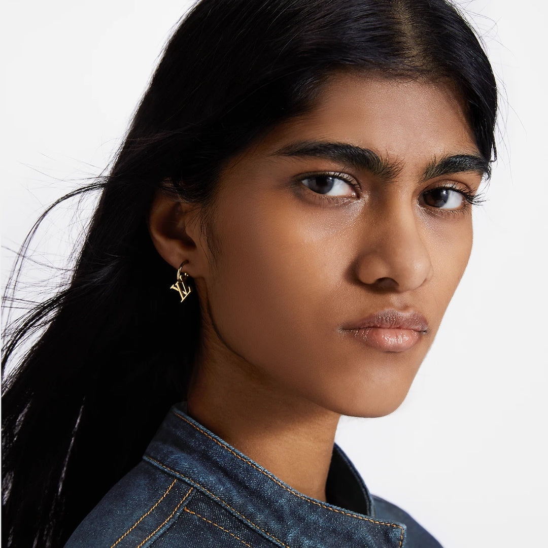 Floral Stud Earrings in Gold-Tone – White Detail styled product view