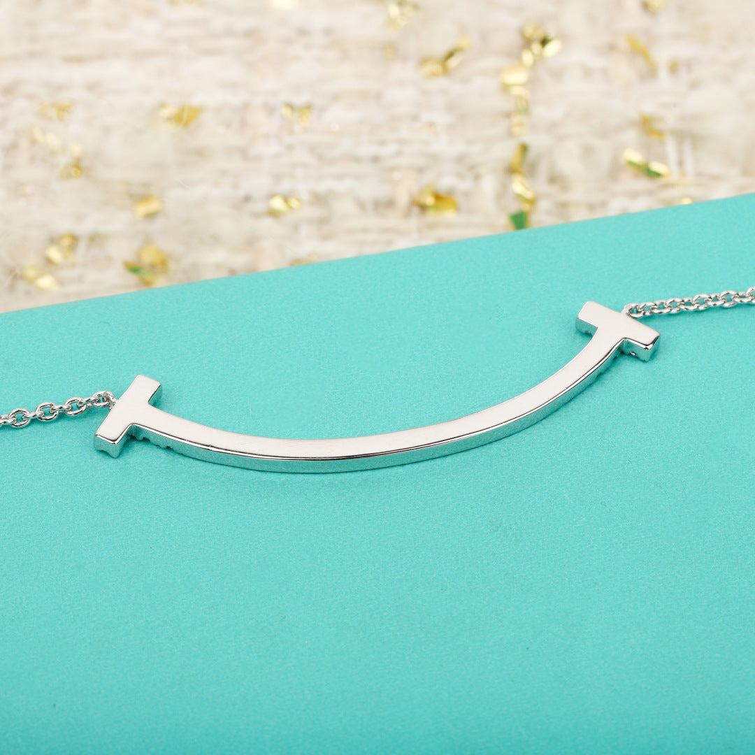 Signature Motif Bracelet in Gold-Tone close-up detail