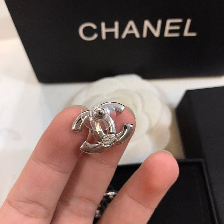 Double-C Emblem Stud Earrings in Polished Metal-Tone – Design 380 front product view