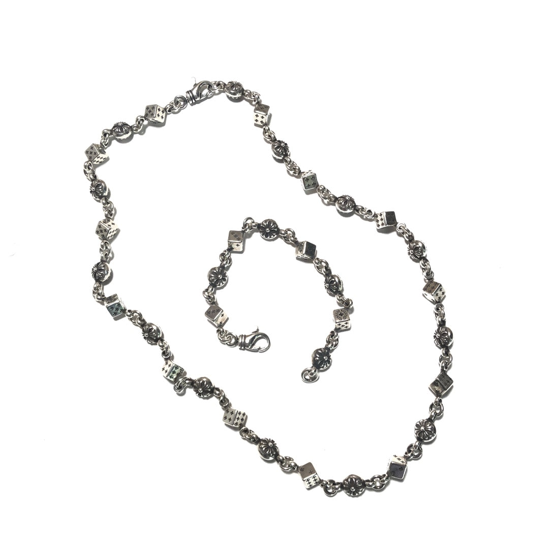Cross Pendant Necklace in Metal-Tone – Dice Detail front product view