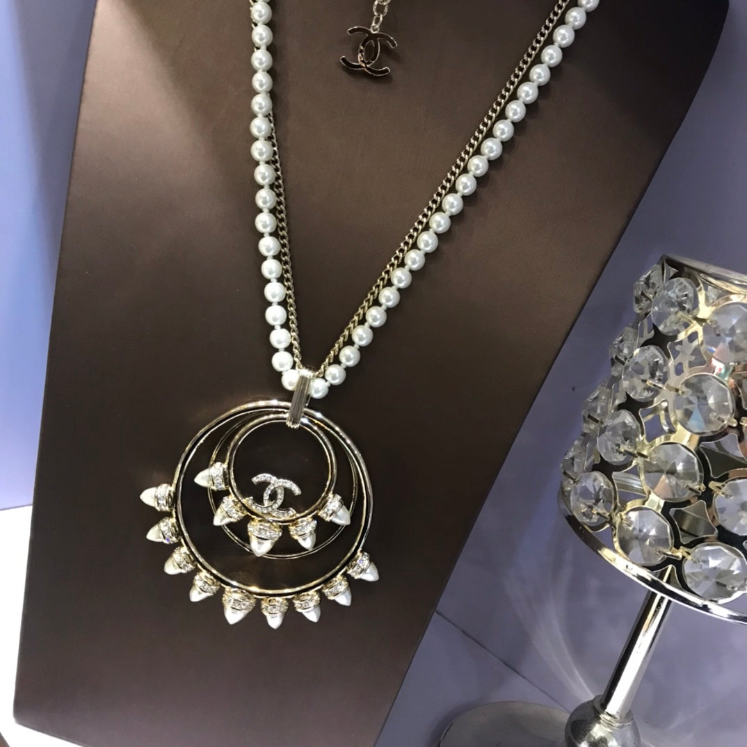 Double-C Emblem Pendant Necklace in Polished Metal-Tone – Design 004 front product view