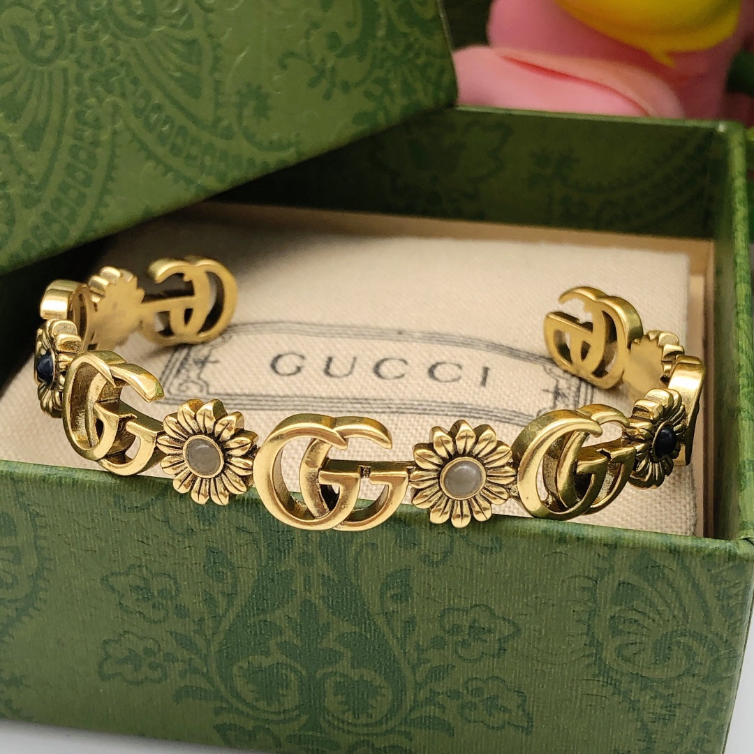 Floral Bangle in Polished Metal-Tone close-up detail