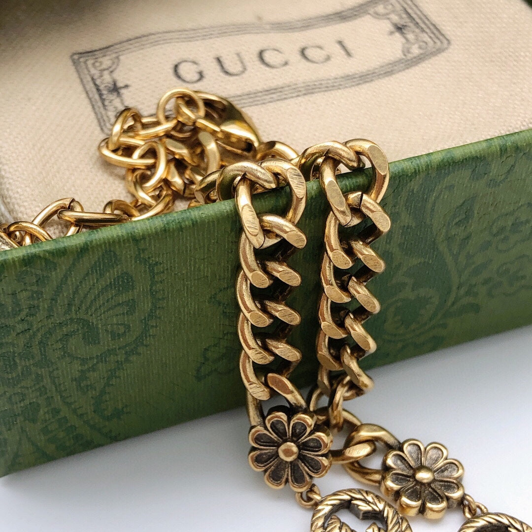Double-G Emblem Pendant Necklace in Polished Metal-Tone – Design 260 close-up detail
