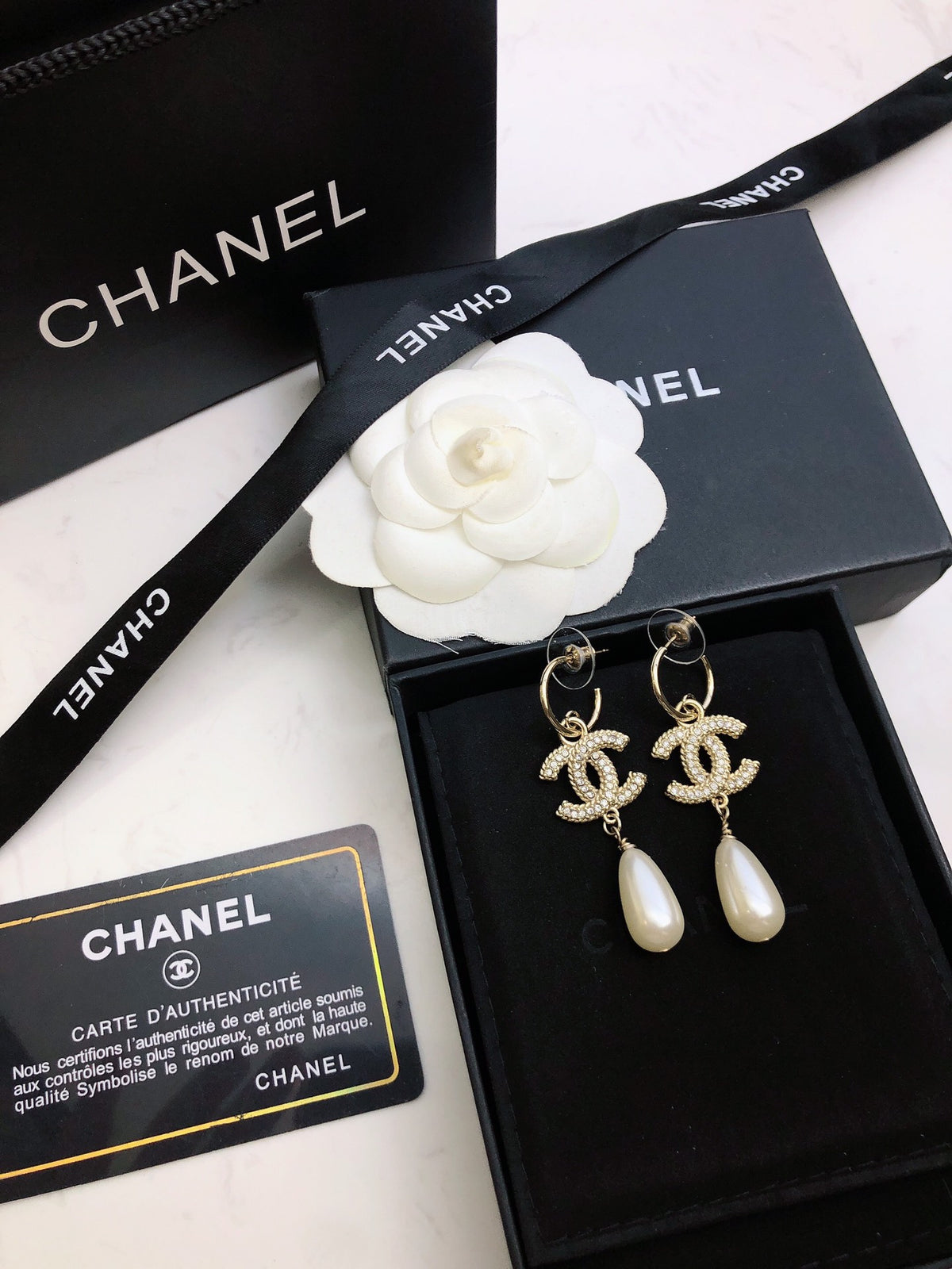Signature Emblem Stud Earrings in Polished Metal-Tone – Design 109 detail view