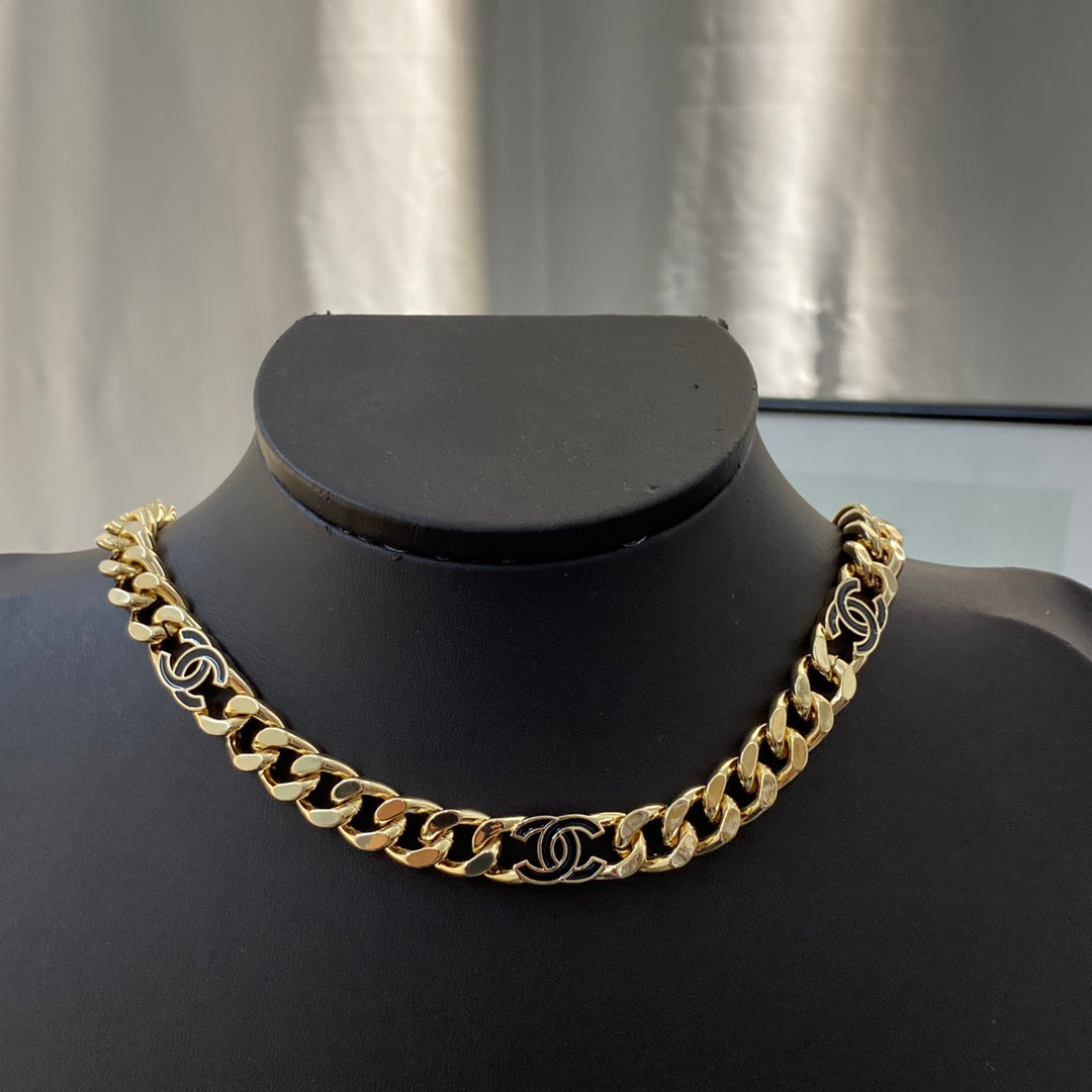 Signature Emblem Bracelet in Polished Metal-Tone – Black Detail – Design 002 front product view